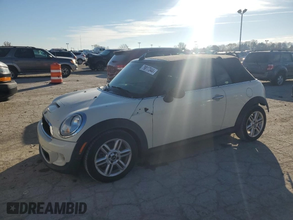 2015 MINI Convertible S with VIN WMWZP3C52FT708377, listed as a Copart auction lot 79817344 with 54,466 mi miles and Salvage title. Bid and sale history available at DreamBid. Image 1.