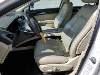 2015 Lincoln MKZ Hybrid z VIN 3LN6L2LU5FR626515, wystawiony jako Copart lot #55239255 z przebiegiem 143 117 mil mil oraz Szkoda całkowita • Salvage title. Historia ofert i sprzedaży dostępna na DreamBid. Obrazek 7.