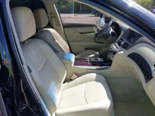 2012 Infiniti M with VIN JN1BY1AR1CM392880, listed as a IAAI auction lot 42012317 with 106,000 mi miles and . Bid and sale history available at DreamBid. Image 5.