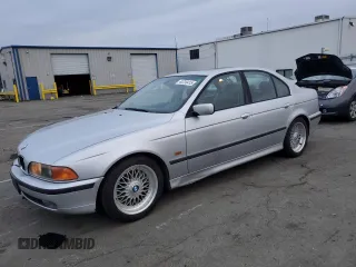 2000 BMW 5 Series 528iA with VIN WBADM6342YGV01382, listed as a Copart auction lot 44736415 with 167,919 mi miles and Salvage Title. Bid and sale history available at carsss.com. Image 1.