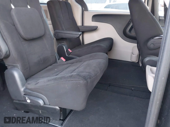2012 Dodge Grand Caravan SXT with VIN 2C4RDGCG1CR141019, listed as a IAAI auction lot 42088541 with 148,931 mi miles and . Bid and sale history available at DreamBid. Image 8.
