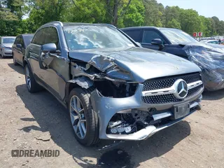 2021 Mercedes-Benz GLC 300 with VIN W1N0G8EB2MF885141, listed as a IAAI auction lot 42394901 with 64,376 mi miles and . Bid and sale history available at DreamBid. Image 1.