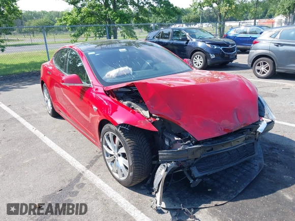 2016 Tesla Model S 90D z VIN 5YJSA1E4XGF171244, wystawiony jako IAAI lot #42584589 z przebiegiem 85 412 mil mil oraz . Historia ofert i sprzedaży dostępna na DreamBid. Obrazek 1.