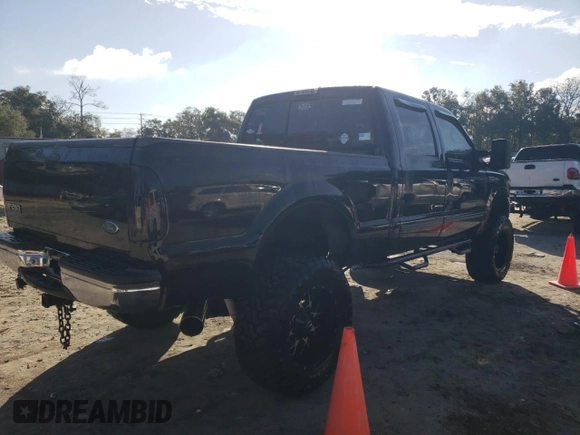 1999 Ford Super Duty F-250 XL with VIN 1FTNW21FXXEE82945, listed as a Copart auction lot 85428404 with 232,556 mi miles and Salvage Title. Bid and sale history available at carsss.com. Image 3.