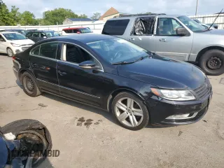 2014 Volkswagen CC R-Line with VIN WVWBP7AN2EE507967, listed as a Copart auction lot 65423594 with 121,212 mi miles and Salvage Title. Bid and sale history available at carsss.com. Image 4.