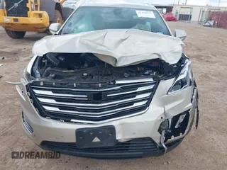 2017 Cadillac XT5 Premium Luxury FWD with VIN 1GYKNCRSXHZ193338, listed as a IAAI auction lot 42134235 with Not provided miles and . Bid and sale history available at DreamBid. Image 13.