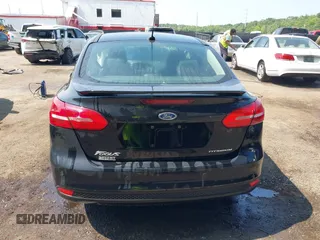 2018 Ford Focus Titanium z VIN 1FADP3J22JL220986, wystawiony jako IAAI lot #42410253 z przebiegiem 40 791 mil mil oraz . Historia ofert i sprzedaży dostępna na DreamBid. Obrazek 16.
