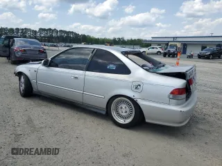 2000 Honda Civic EX z VIN 1HGEJ8242YL111341, wystawiony jako Copart lot #56953105 z przebiegiem 251 633 mil mil oraz Szkoda całkowita • Salvage title. Historia ofert i sprzedaży dostępna na DreamBid. Obrazek 2.