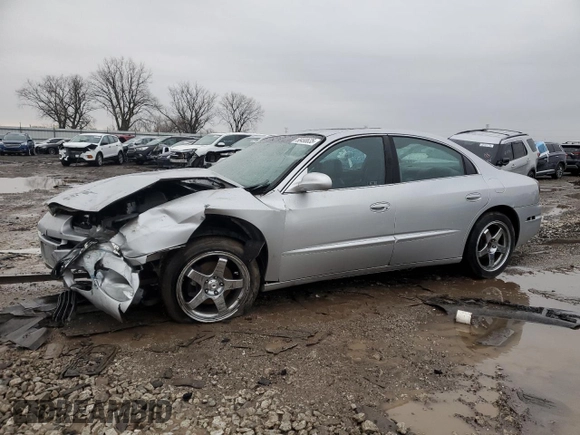 2003 Oldsmobile Aurora z VIN 1G3GS64C034150414, wystawiony jako Copart lot #88490635 z przebiegiem 119 061 mil mil oraz Szkody całkowita. Historia ofert i sprzedaży dostępna na DreamBid. Obrazek 1.