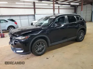 2019 Mazda CX-5 Touring with VIN JM3KFBCM4K0571793, listed as a Copart auction lot 49696825 with 97,305 mi miles and Salvage Title. Bid and sale history available at carsss.com. Image 1.