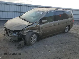 2009 Honda Odyssey EX-L with VIN 5FNRL38649B413532, listed as a Copart auction lot 79867014 with 308,701 mi miles and Salvage Title. Bid and sale history available at DreamBid. Image 1.