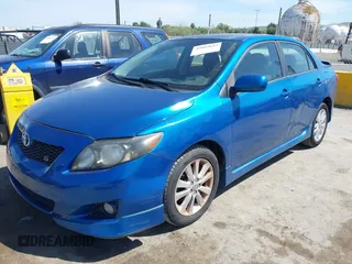 2009 Toyota Corolla with VIN 1NXBU40E49Z022648, listed as a IAAI auction lot 42042633 with 134,628 mi miles. Bid and sale history available at carsss.com. Image 2.