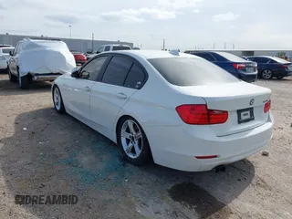 2012 BMW 3 Series 328i with VIN WBA3A5C53CF341664, listed as a IAAI auction lot 41991169 with 168,808 mi miles and . Bid and sale history available at carsss.com. Image 3.