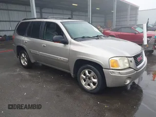2002 GMC Envoy SLT with VIN 1GKDS13S322491528, listed as a IAAI auction lot 41482996 with 251,182 mi miles. Bid and sale history available at carsss.com. Image 1.