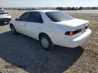 1997 Toyota Camry LE z VIN JT2BG22K4V0077954, wystawiony jako Copart lot #57682355 z przebiegiem 254 596 mil mil oraz Szkoda całkowita • Salvage title. Historia ofert i sprzedaży dostępna na DreamBid. Obrazek 2.