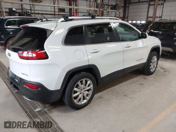 2014 Jeep Cherokee Limited with VIN 1C4PJMDS1EW235980, listed as a IAAI auction lot 41994044 with 128,292 mi miles and . Bid and sale history available at DreamBid. Image 4.