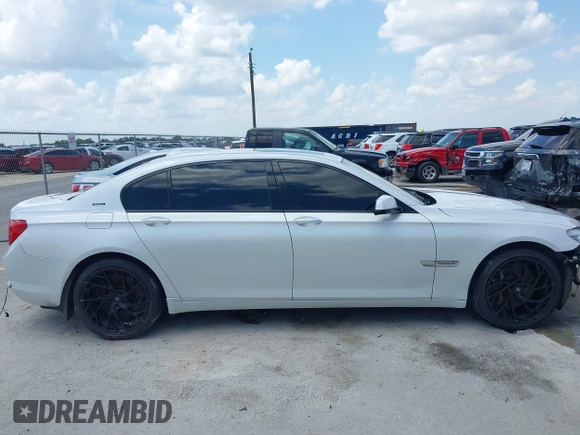 2012 BMW 7 Series 750Li with VIN WBAKB8C54CC964576, listed as a IAAI auction lot 42499443 with 78,728 mi miles and . Bid and sale history available at DreamBid. Image 14.
