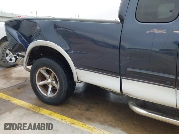 2000 Ford F-150 XL with VIN 1FTRX17L0YKA68579, listed as a IAAI auction lot 41941226 with 1 mi miles. Bid and sale history available at carsss.com. Image 18.