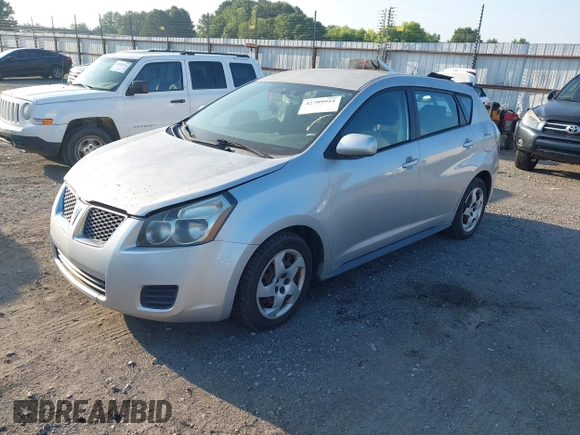 2009 Pontiac Vibe 1SA with VIN 5Y2SP678X9Z473576, listed as a IAAI auction lot 42709951 with 165,434 mi miles and . Bid and sale history available at DreamBid. Image 2.