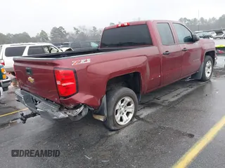 2014 Chevrolet Silverado 1500 LT with VIN 1GCVKRECXEZ296266, listed as a IAAI auction lot 41606586 with 233,832 mi miles and . Bid and sale history available at DreamBid. Image 4.