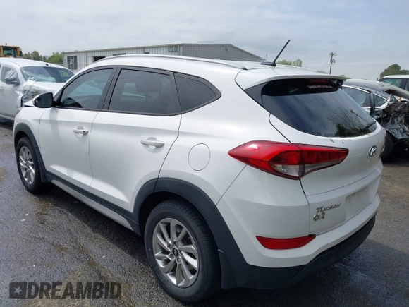 2017 Hyundai Tucson SE z VIN KM8J33A40HU383601, wystawiony jako IAAI lot #41947577 z przebiegiem 92 722 mil mil oraz . Historia ofert i sprzedaży dostępna na DreamBid. Obrazek 3.