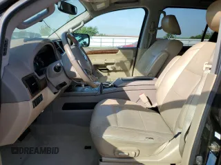2013 Nissan Armada SL z VIN 5N1BA0ND1DN605912, wystawiony jako Copart lot #53389245 z przebiegiem 165 715 mil mil oraz Szkoda całkowita • Salvage title. Historia ofert i sprzedaży dostępna na DreamBid. Obrazek 7.