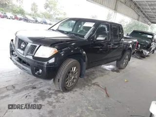 2012 Nissan Frontier SV with VIN 1N6AD0EV1CC411114, listed as a IAAI auction lot 42384760 with 122,399 mi miles and . Bid and sale history available at DreamBid. Image 2.