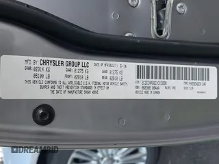 2014 Chrysler 300 C with VIN 2C3CCAKG9EH201407, listed as a IAAI auction lot 41658245 with 95,891 mi miles and . Bid and sale history available at carsss.com. Image 9.