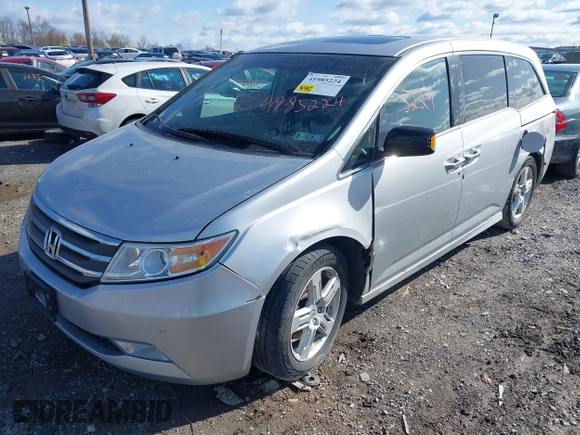 2011 Honda Odyssey Touring with VIN 5FNRL5H92BB049901, listed as a IAAI auction lot 41985224 with 101,957 mi miles and . Bid and sale history available at DreamBid. Image 17.