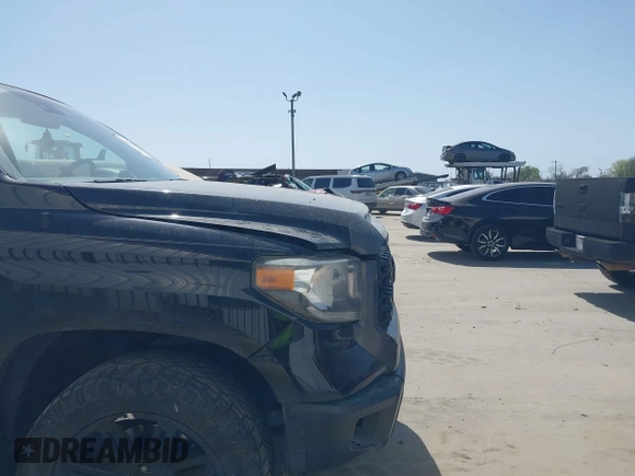2019 Toyota Tundra SR with VIN 5TFRM5F16KX140346, listed as a IAAI auction lot 41830638 with 86,824 mi miles and . Bid and sale history available at DreamBid. Image 13.