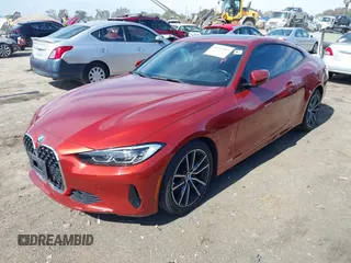 2022 BMW 4 Series 430i with VIN WBA53AP04NCK23797, listed as a IAAI auction lot 41583184 with 42,069 mi miles and . Bid and sale history available at carsss.com. Image 2.