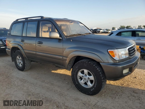 2000 Toyota Land Cruiser z VIN JT3HT05J9Y0123937, wystawiony jako Copart lot #56599145 z przebiegiem 132 262 mil mil oraz Szkoda całkowita • Salvage title. Historia ofert i sprzedaży dostępna na DreamBid. Obrazek 4.