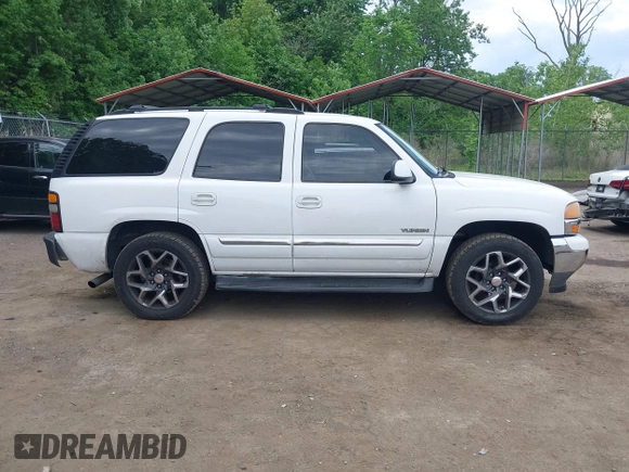 2005 GMC Yukon SLT z VIN 1GKEC13T75R114660, wystawiony jako IAAI lot #42223845 z przebiegiem 199 064 mil mil oraz . Historia ofert i sprzedaży dostępna na DreamBid. Obrazek 13.