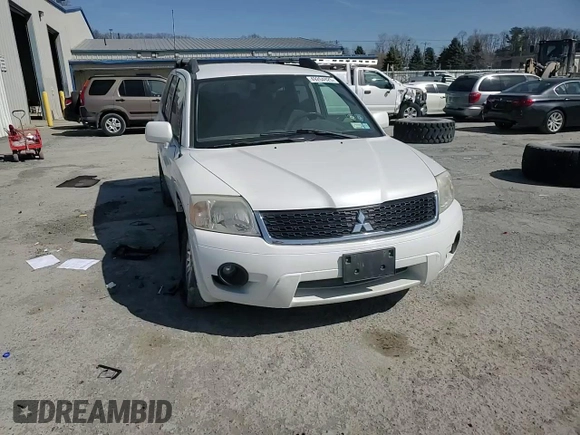 2011 Mitsubishi Endeavor LS z VIN 4A4JN2AS4BE032045, wystawiony jako Copart lot #49264925 z przebiegiem 128 393 mil mil oraz Szkoda całkowita • Salvage title. Historia ofert i sprzedaży dostępna na DreamBid. Obrazek 12.