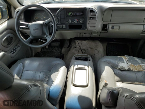 1998 GMC Suburban with VIN 1GKFK16RXWJ721305, listed as a Copart auction lot 64112165 with 197,756 mi miles and Clean title. Bid and sale history available at DreamBid. Image 8.