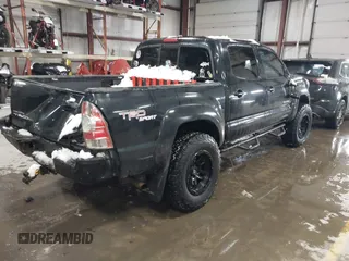 2009 Toyota Tacoma with VIN 3TMLU42N79M027885, listed as a IAAI auction lot 41146330 with 261,832 mi miles and . Bid and sale history available at DreamBid. Image 4.