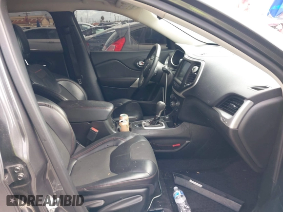 2018 Jeep Cherokee Trailhawk with VIN 1C4PJMBX0JD534722, listed as a IAAI auction lot 41557426 with 109,429 mi miles and . Bid and sale history available at DreamBid. Image 5.