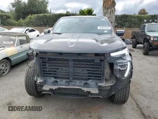 2023 GMC Canyon 2WD Elevation with VIN 1GTP5BEK8P1195517, listed as a Copart auction lot 43479755 with 21,633 mi miles and Salvage Title. Bid and sale history available at DreamBid. Image 5.