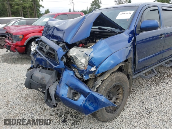 2015 Toyota Tacoma with VIN 3TMLU4EN1FM186747, listed as a IAAI auction lot 42493658 with 104,100 mi miles and . Bid and sale history available at DreamBid. Image 6.