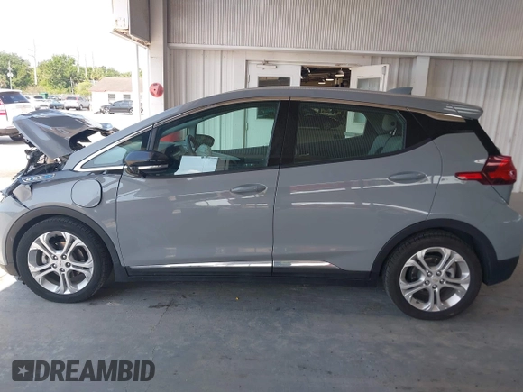 2020 Chevrolet Bolt EV LT z VIN 1G1FY6S01L4109222, wystawiony jako IAAI lot #42231173 z przebiegiem 43 570 mil mil oraz . Historia ofert i sprzedaży dostępna na DreamBid. Obrazek 14.