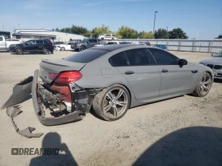 2015 BMW M6 z VIN WBS6C9C52FD467461, wystawiony jako Copart lot #68057084 z przebiegiem 130 687 mil mil oraz Szkoda całkowita • Salvage title. Historia ofert i sprzedaży dostępna na DreamBid. Obrazek 3.
