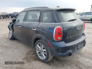 2013 MINI Countryman S with VIN WMWZC3C59DWP24390, listed as a IAAI auction lot 42038509 with 134,903 mi miles and . Bid and sale history available at DreamBid. Image 3.
