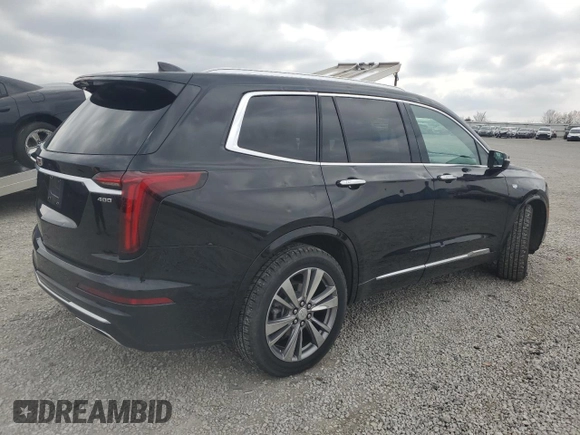 2020 Cadillac XT6 FWD Premium Luxury with VIN 1GYKPCRS2LZ138174, listed as a Copart auction lot 52495655 with 30,822 mi miles and Salvage Title. Bid and sale history available at carsss.com. Image 3.