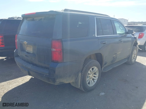 2019 Chevrolet Tahoe LT with VIN 1GNSKBKC6KR186865, listed as a IAAI auction lot 41801047 with 69,391 mi miles. Bid and sale history available at carsss.com. Image 4.