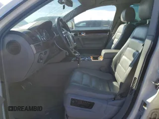 2004 Volkswagen Touareg z VIN WVGCM77L04D040938, wystawiony jako Copart lot #45434315 z przebiegiem 140 769 mil mil oraz Czysty tytuł • Clean title. Historia ofert i sprzedaży dostępna na DreamBid. Obrazek 7.