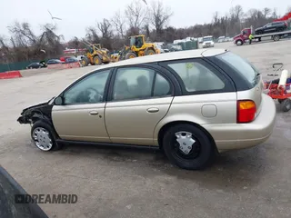 1997 Saturn SW z VIN 1G8ZK8270VZ205793, wystawiony jako IAAI lot #41609103 z przebiegiem 120 754 mil mil oraz . Historia ofert i sprzedaży dostępna na DreamBid. Obrazek 15.