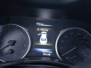 2015 Infiniti Q50 Premium with VIN JN1BV7AP6FM357265, listed as a IAAI auction lot 42104440 with 83,404 mi miles. Bid and sale history available at carsss.com. Image 7.