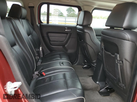 2010 Hummer H3 with VIN 5GTMNLEP0A8140183, listed as a Copart auction lot 77991624 with 148,563 mi miles and Clean Title. Bid and sale history available at DreamBid. Image 11.