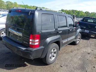 2008 Jeep Liberty Sport with VIN 1J8GP28KX8W227953, listed as a IAAI auction lot 42049588 with 310,901 mi miles. Bid and sale history available at carsss.com. Image 4.