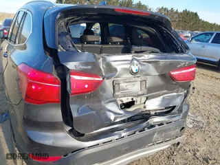 2018 BMW X1 xDrive28i with VIN WBXHT3C33J5F90349, listed as a IAAI auction lot 41385063 with 55,994 mi miles. Bid and sale history available at carsss.com. Image 6.